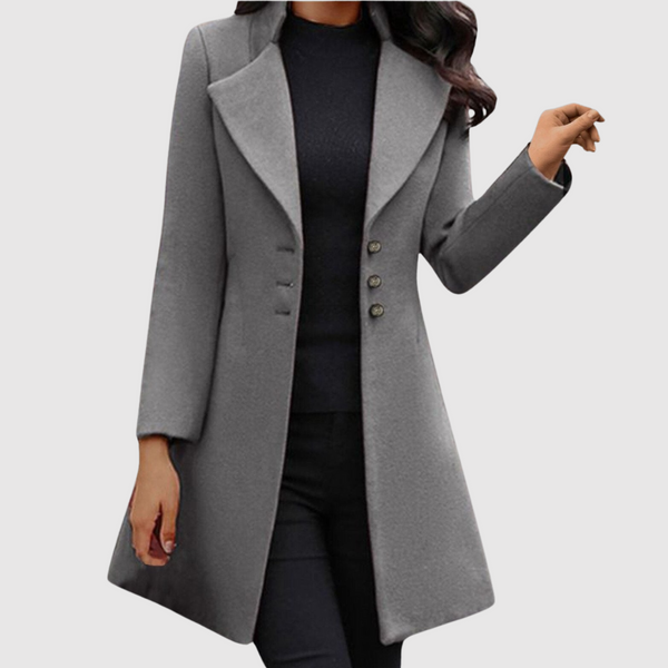 Elegante damesjas met klassieke knopen en getailleerd silhouet in effen kleur