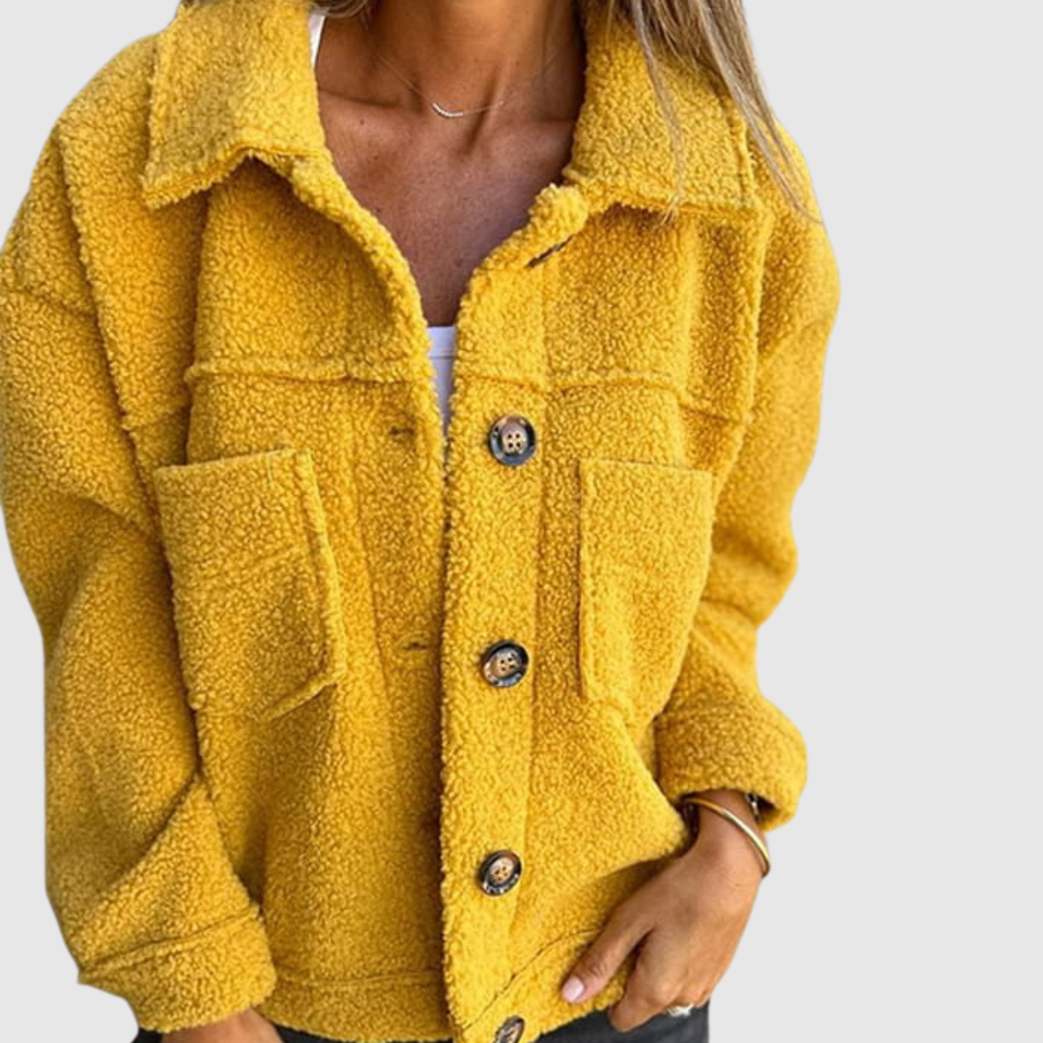 Warme teddy jas voor dames met grote voorzakken, kraag en knoopsluiting