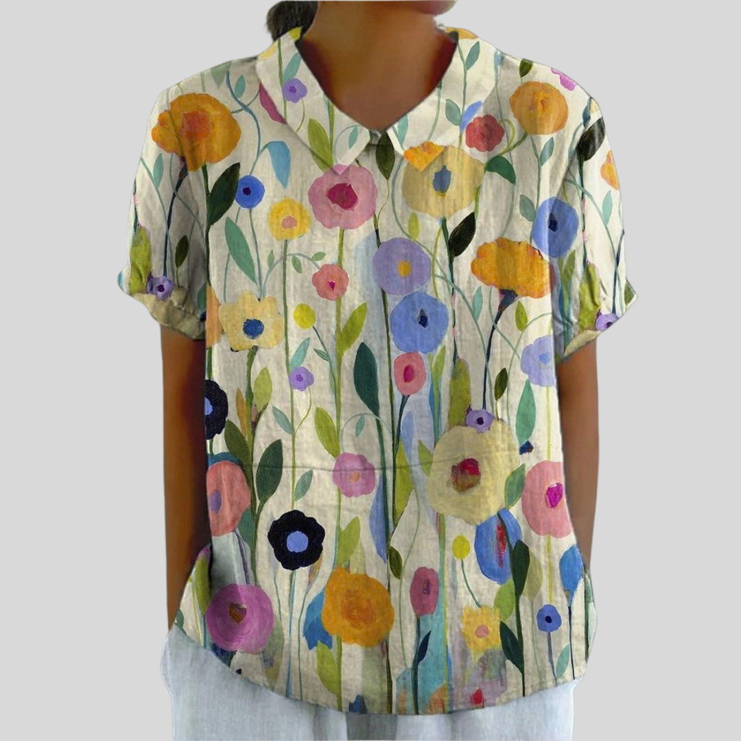 Luchtige dames top met bloemenprint, losse pasvorm en ademende stof voor warme dagen