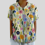 Luchtige dames top met bloemenprint, losse pasvorm en ademende stof voor warme dagen