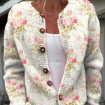 Pauline dames roze grofgebreid vest met bloemenprint