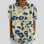 Elegante dames top met bloemenprint en zachte stof, mooi bij jeans of een midirok