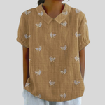 Elegante dames top met bloemenprint en zachte stof, mooi te combineren met jeans of rok