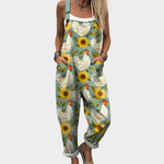 Luchtige jumpsuit met bloemenprint, wijde pijpen en verstelbare bandjes in soepele stof
