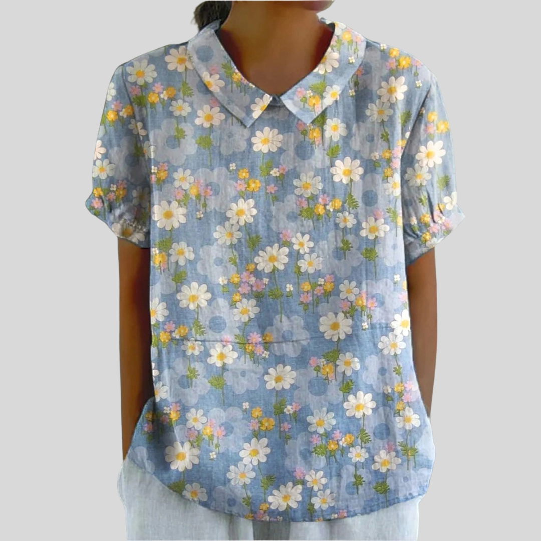 Vrouwelijke dames top met bloemenprint, zacht materiaal en flatteus los of ingestopt te dragen