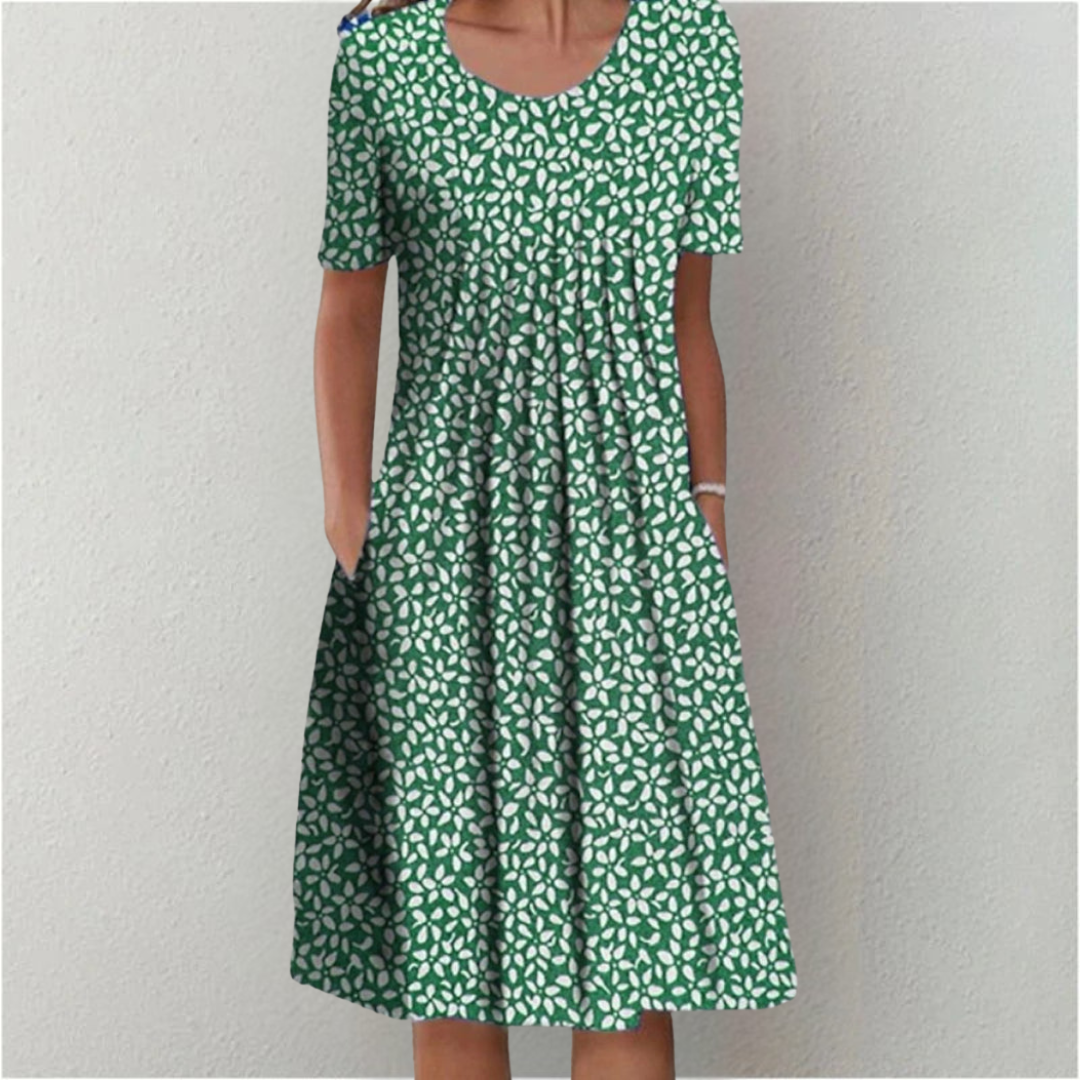 Bloemenjurk voor dames met bloemendessin, verborgen zijzakken en vlotte val