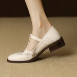 Bruine leren Mary Jane schoenen met T-band, lage blokhak en vintage stiksels