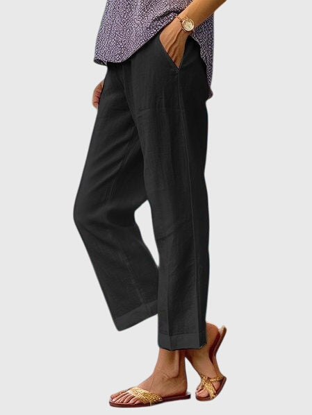 Elegante damesbroek in effen kleur met rechte pijpen, sierstiksel en discrete voorzak