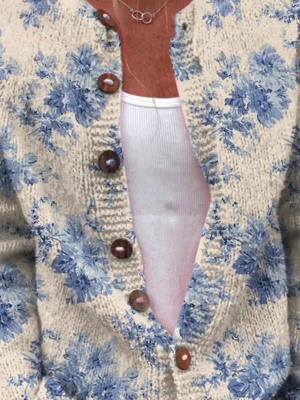 Nadine dames blauw gebreid vest met botanische print