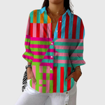 Ruimvallende damesblouse met vrolijke print, wijde snit en verstelbare lange mouwen