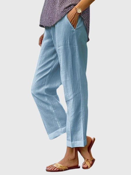 Elegante damesbroek in effen kleur met rechte pijpen, sierstiksel en discrete voorzak