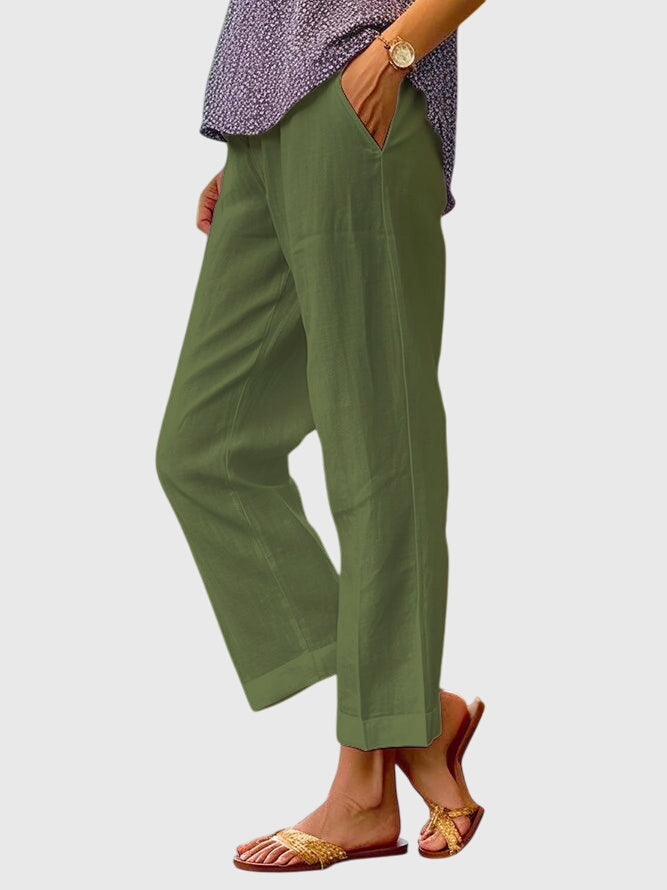 Elegante damesbroek in effen kleur met rechte pijpen, sierstiksel en discrete voorzak