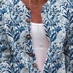 Tamara dames blauw gebreid vest met botanische vogelprint