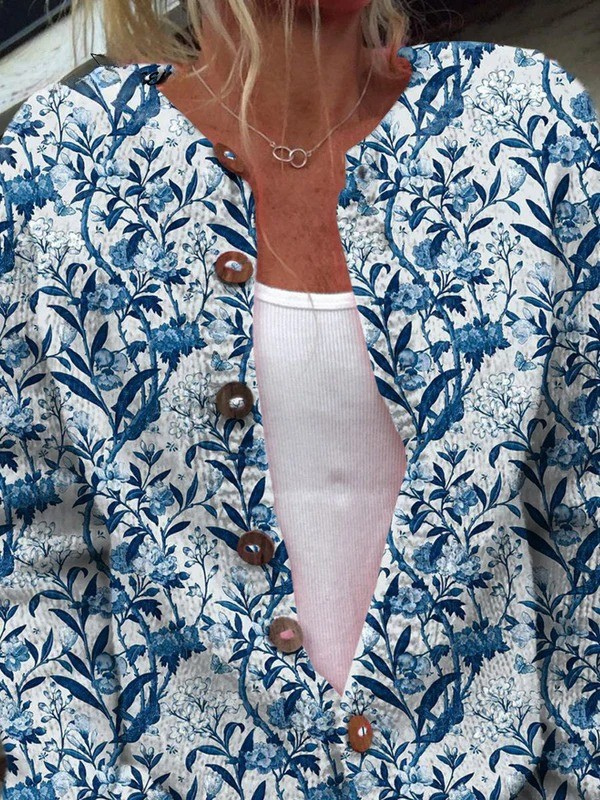Tamara dames blauw gebreid vest met botanische vogelprint