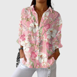 Zachte damesblouse met kleurrijke bloemenprint, ruime snit en verstelbare mouwen