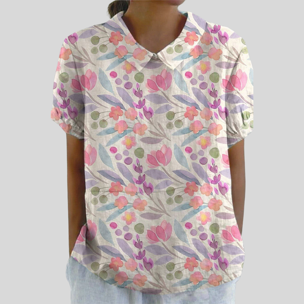 Ademende dames top met bloemenprint en losse snit, prettig te dragen op warme dagen