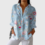 Kleurrijke damesblouse met bloemenprint, verstelbare mouwen en nette knoopsluiting