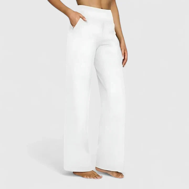 Elegante damesbroek in effen kleur met rechte pijpen, elastische tailleband en steekzakken