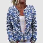 Licht dames vest met bloemenprint en klassieke knoopsluiting aan de voorkant