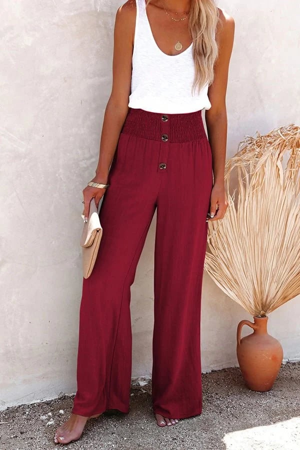 Relaxte broek met hoge taille, wijde pijpen en subtiele knopen in een neutrale tint