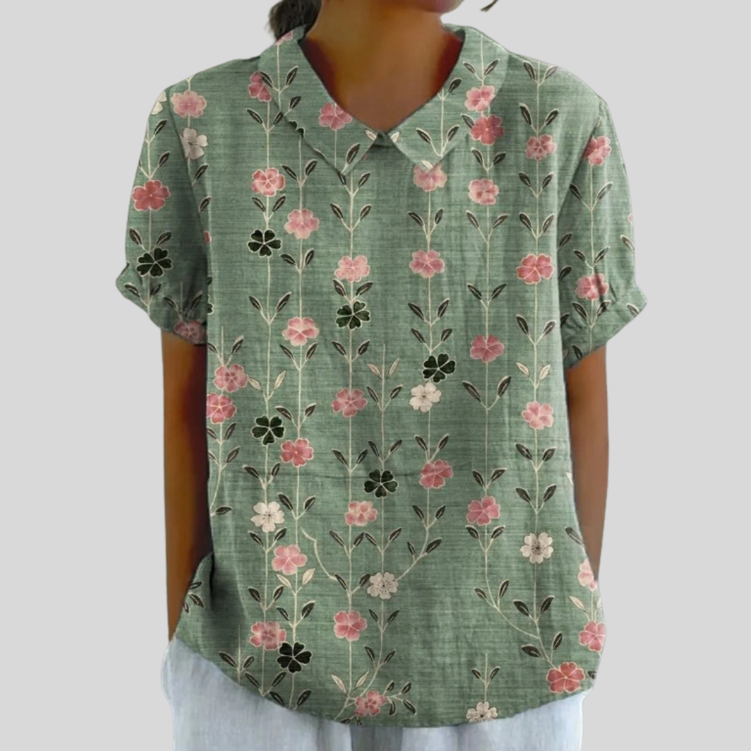 Losvallende dames top met bloemenprint van ademende stof in een geliefd model