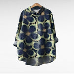 Lichte dames zomerblouse met lange mouwen en verfijnde artistieke print in ademende stof