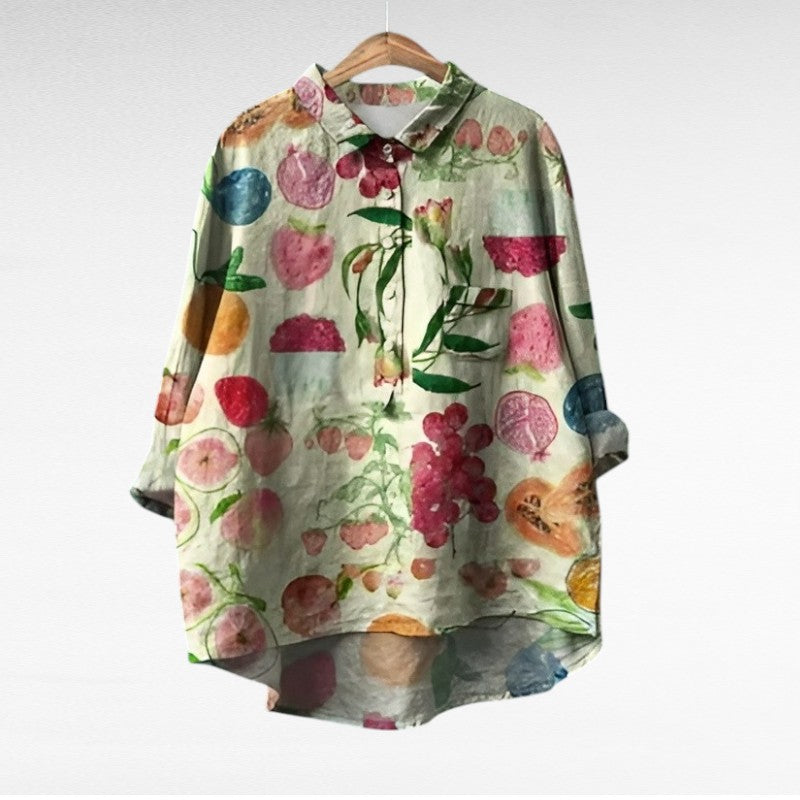 Lichte dames zomerblouse met lange mouwen en verfijnde artistieke print in ademende stof