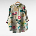 Lichte dames zomerblouse met lange mouwen en verfijnde artistieke print in ademende stof