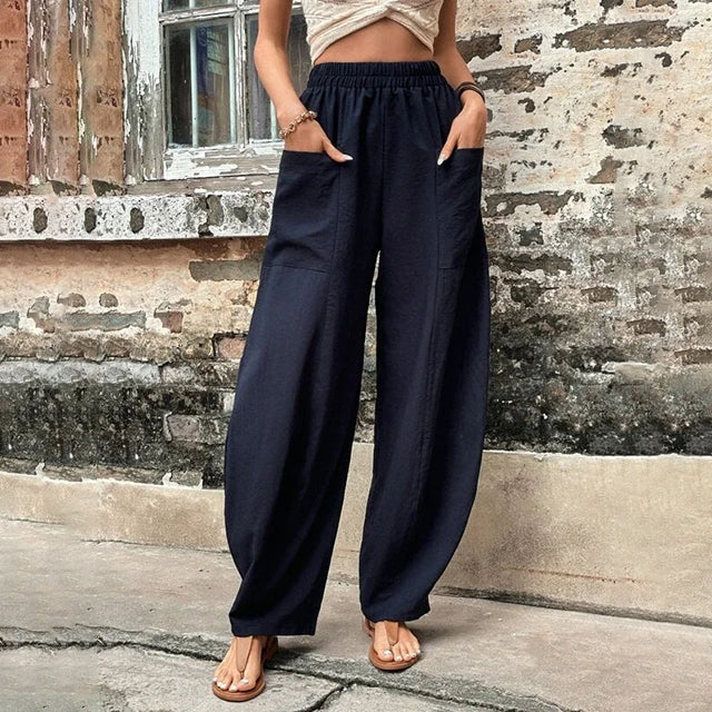 Wijde broek met hoge elastische taille en grote opgestikte zakken in een luchtige linnenmix