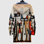 Hoodie met kattenprint in warme gouden tinten op een donkere ondergrond en ruime pasvorm