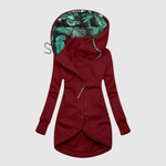 Elegante lange dames parka met capuchon en diepe steekzakken in effen kleur