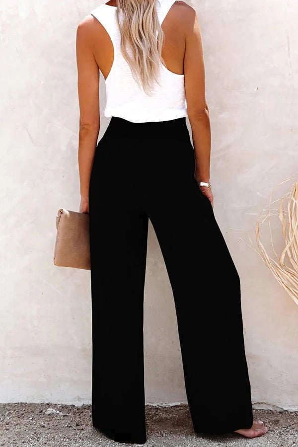 Relaxte broek met hoge taille, wijde pijpen en subtiele knopen in een neutrale tint