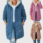 Lange teddyjas met capuchon en steekzakken in zachte teddystof voor dames