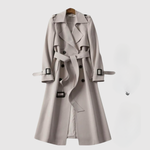Lange damesjas met ceintuur in de taille en klassieke revers in effen kleur