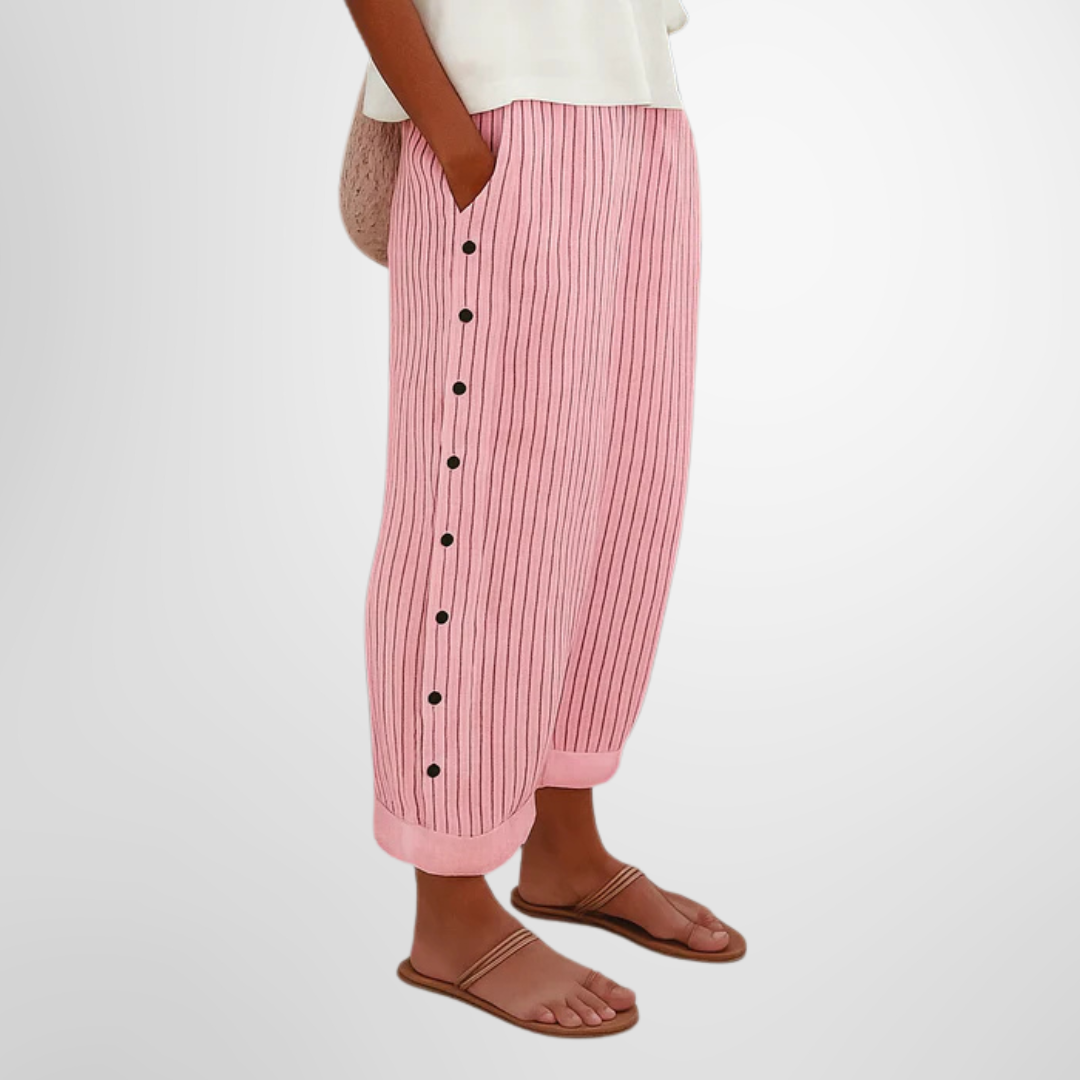 Elegante wijde damesbroek in neutrale kleur met elastische tailleband en soepel vallende pijpen
