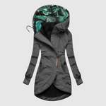 Elegante lange dames parka met capuchon en diepe steekzakken in effen kleur