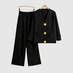 Manon dames jumpsuit met goudkleurige knopen