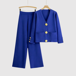 Manon dames jumpsuit met goudkleurige knopen