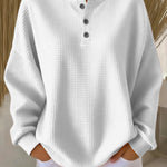 Corina dames sweater met structuur en henley-knoopsluiting