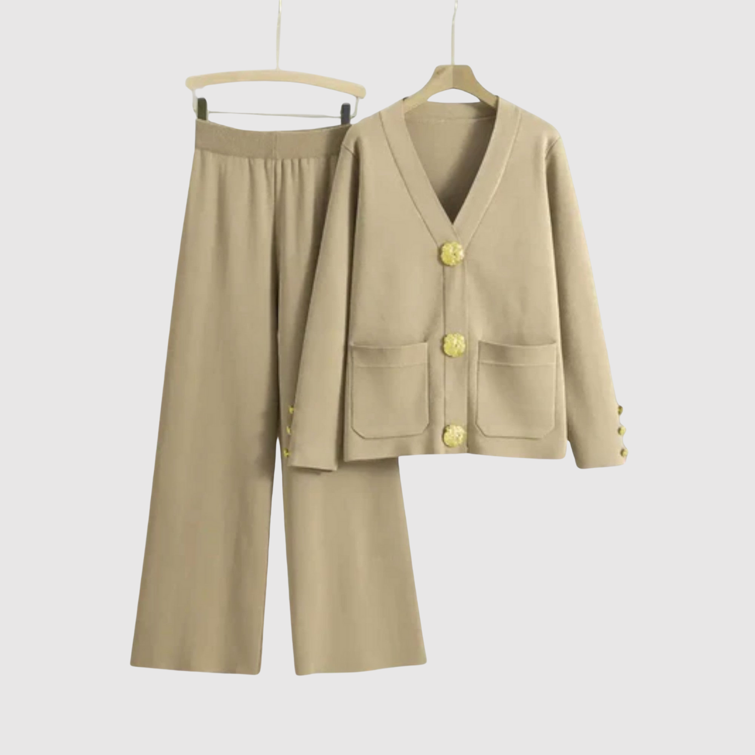 Manon dames jumpsuit met goudkleurige knopen