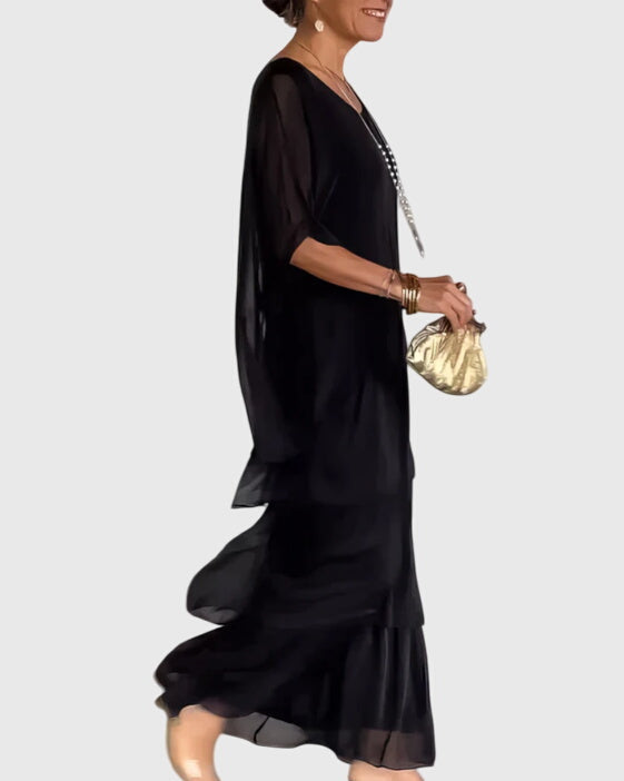 Elegante lange jurk met vloeiende val in een tijdloze effen kleur voor dames