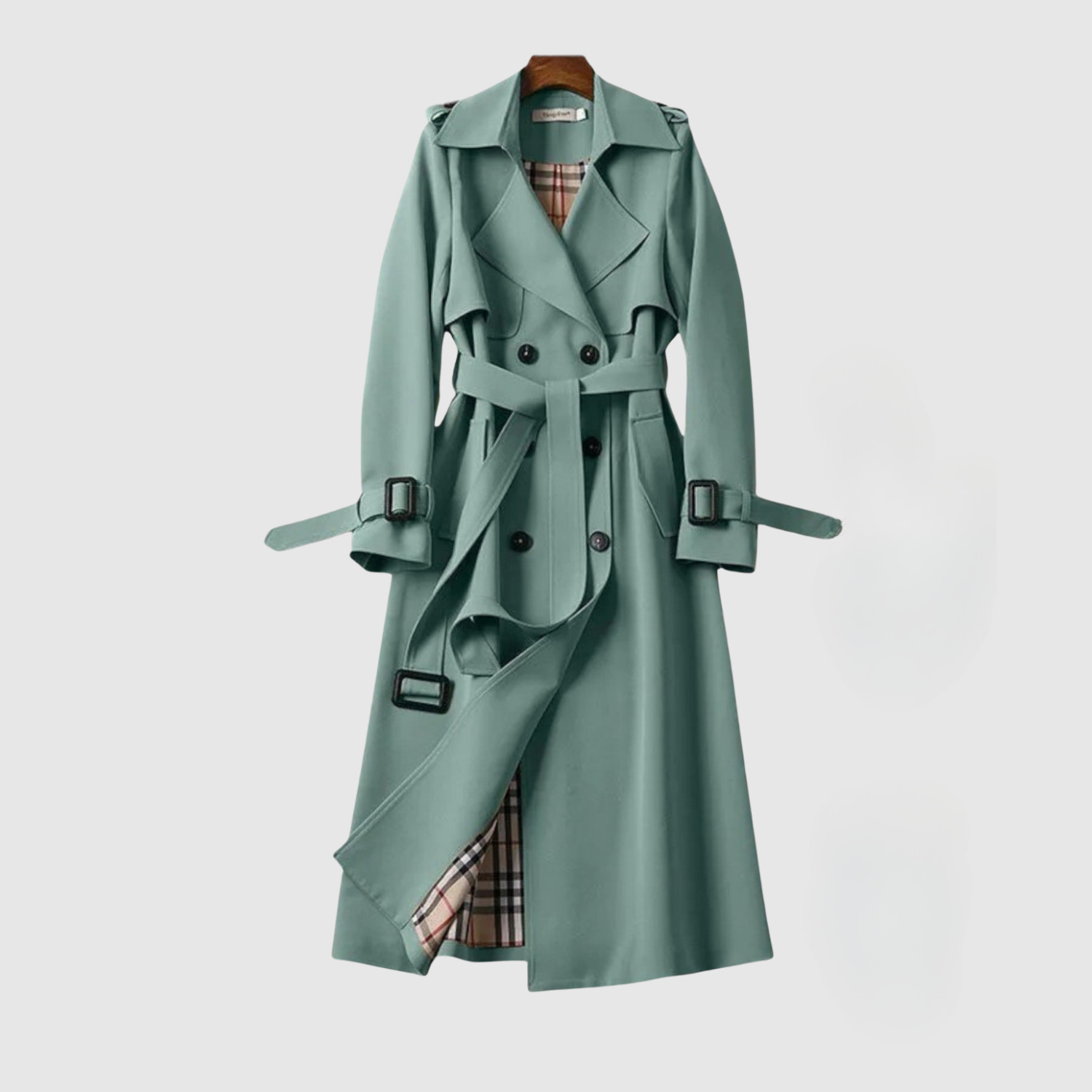 Lange damesjas met ceintuur in de taille en klassieke revers in effen kleur