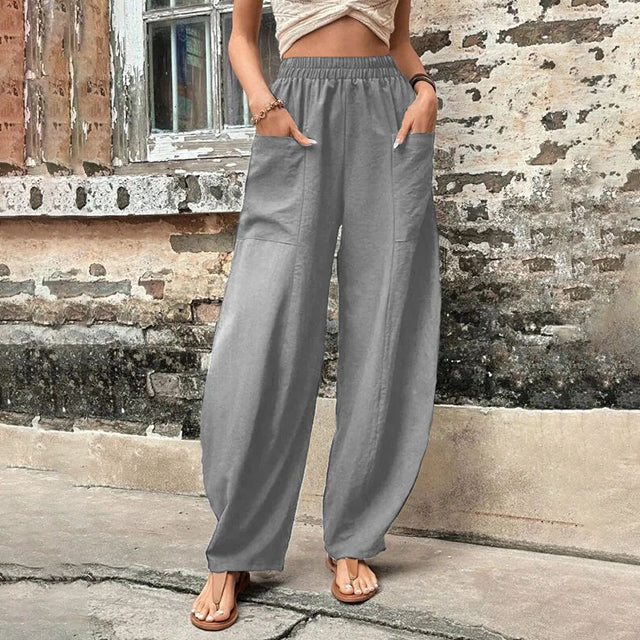 Wijde broek met hoge elastische taille en grote opgestikte zakken in een luchtige linnenmix