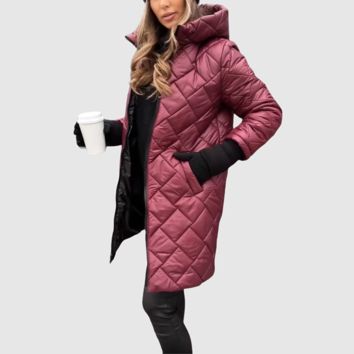 Elegante lange gewatteerde dames winterjas met capuchon en diepe steekzakken
