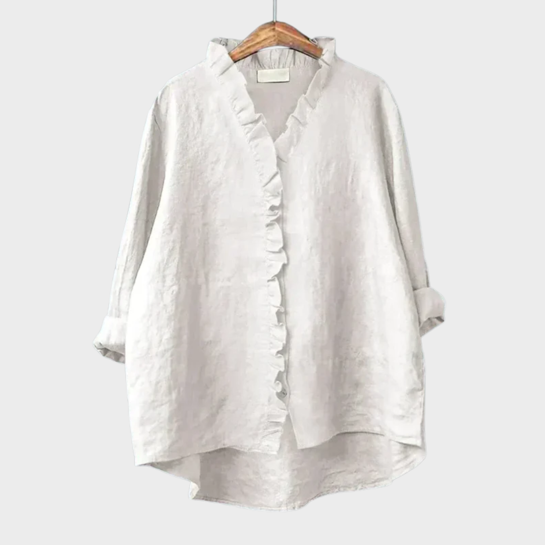 Lichte dames zomerblouse met verfijnd dessin en lange mouwen in ademende stof