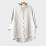 Lichte dames zomerblouse met verfijnd dessin en lange mouwen in ademende stof