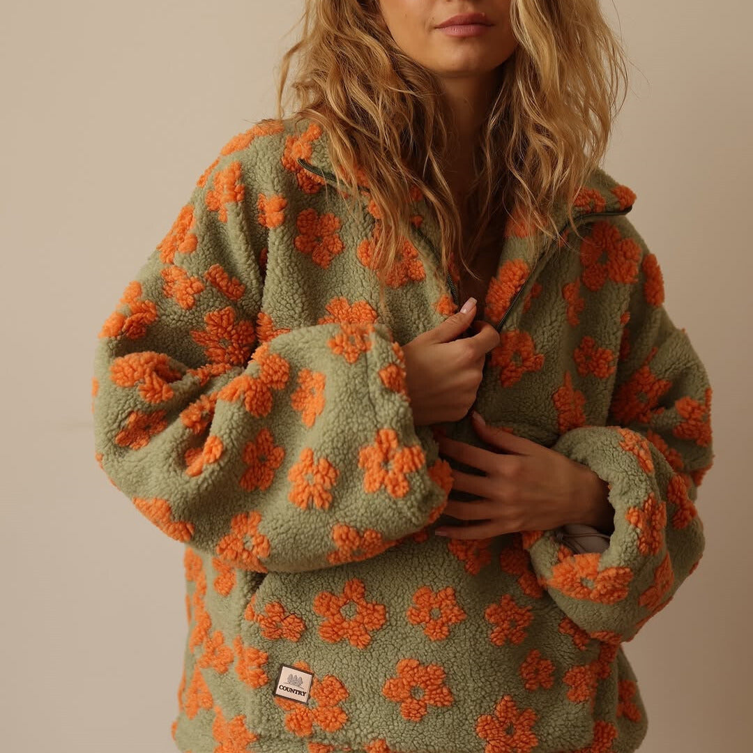 Zachte fleece dames trui met kleurrijke bloemenprint en lange mouwen, ruime pasvorm