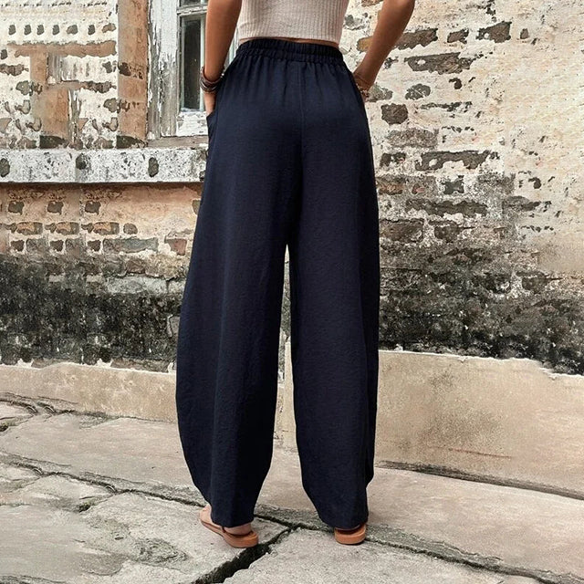 Wijde broek met hoge elastische taille en grote opgestikte zakken in een luchtige linnenmix