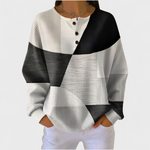 Manon dames monochrome trui met kleurvlakken en wafelstructuur