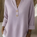 Nelleke dames top met structuur en henley-knoopsluiting
